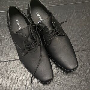 Calvin Klein Men's Sleek Black Oxfords
